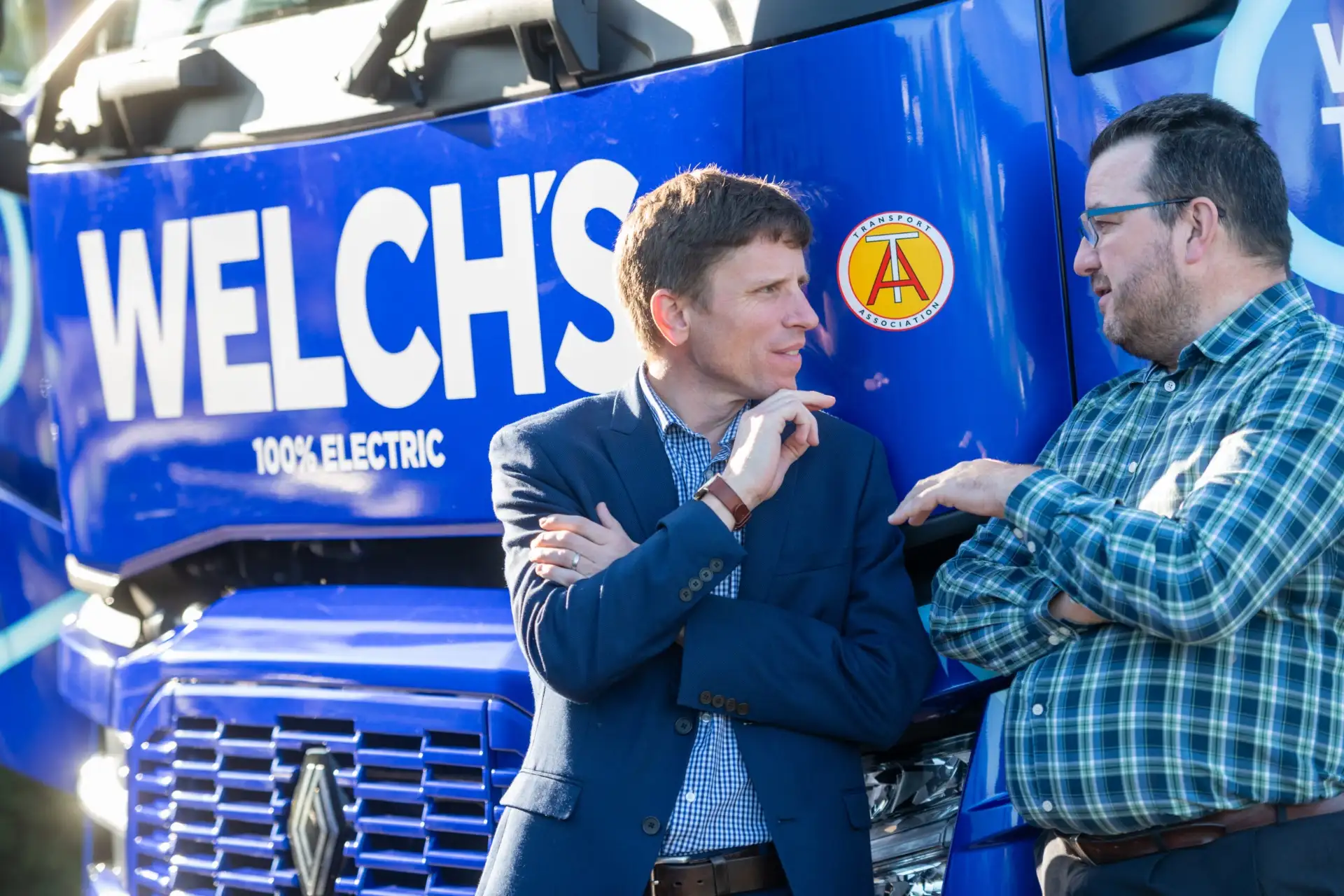 People collaborating at a freight industry event