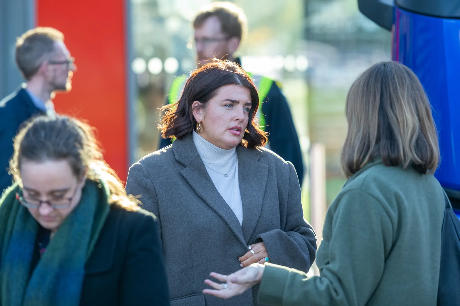 People collaborating at a freight industry event